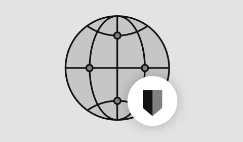 Security shield in front of a world globe