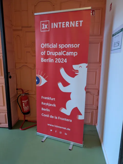 Roll-up banner of 1xINTERNET at DrupalCamp Berlin 2024