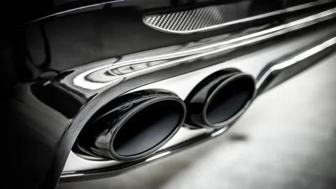 The rear of a car with an exhaust pipe