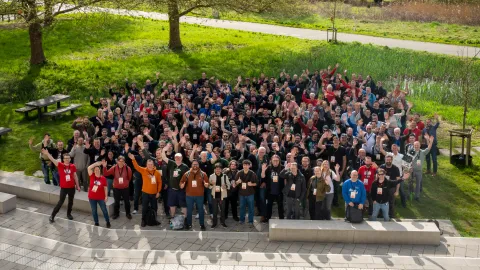 300 attendees gather for the group photo at Drupal Dev Days Leuven